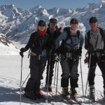The team ski touring the Tasman Glacier - Mt Cook in the left back ground